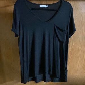 Woman’s black pocket tee size medium